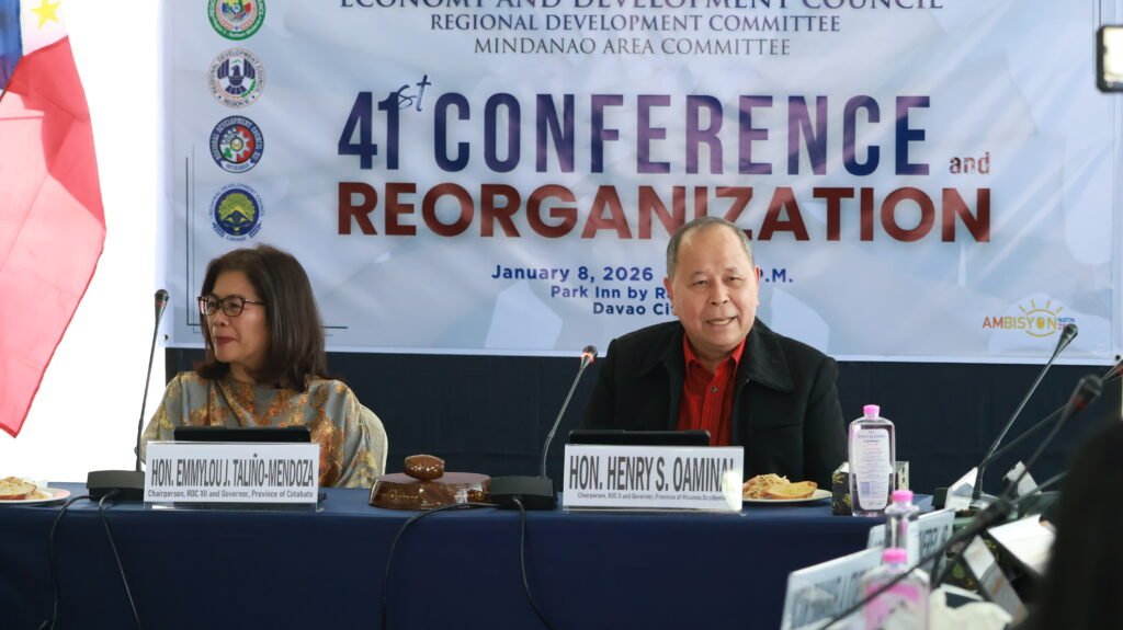 Gov. Henry S. Oaminal Elected RDCOM–MAC Chair in Historic Mindanao Conference Henry S. Oaminal is photographed during the Economy and Development Council Regional Development Committee–Mindanao Area Committee (RDCOM–MAC) Conference, where he was elected as Chair. The historic conference brought together leaders from across Mindanao to strengthen regional cooperation and advance sustainable and inclusive development initiatives throughout the island.