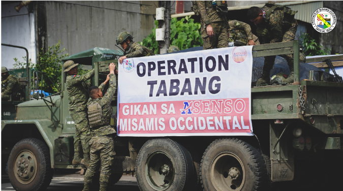 Misamis Occidental extends relief assistance to Iligan City amid Tropical Storm Basyang A Philippine Army truck carrying relief goods displays a tarpaulin that reads "Operation Tabang Gikan sa Asenso Misamis Occidental." The truck is part of the humanitarian assistance mission delivering aid to families in Iligan City affected by Typhoon Basyang.