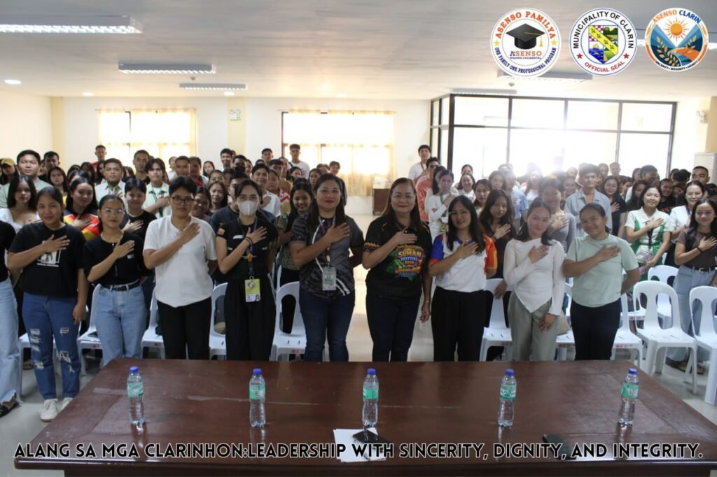 In the Municipality of Clarin, Local Officials stand with OFOP beneficiaries during the recent March Payout for the program. 
